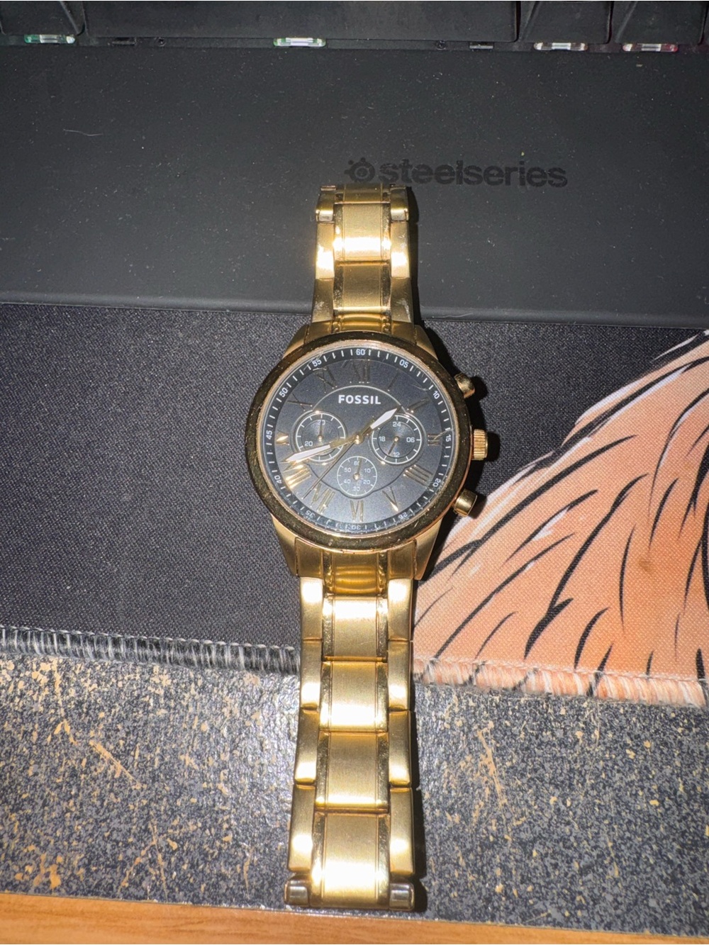 Fossil Gold Tone Watch with Black Dial and Chronograph